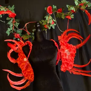 Carnival Backpack with Red Feathered Design and Floral Garland Accessories