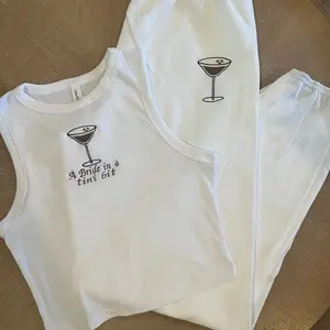 A bride in a tini bit espresso embroidered set