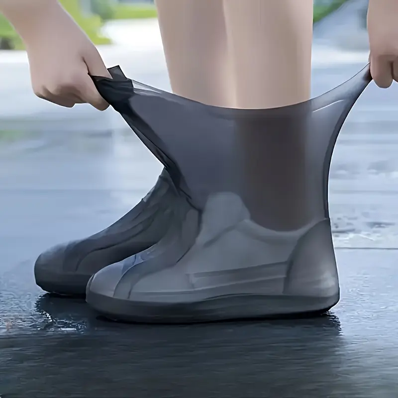 A pair of durable silicone shoe covers - waterproof, reusable, non-slip rain protectors for men and women, easy to clean, resilient outdoor gear