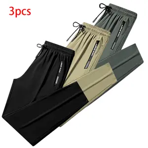 Men’s quick-dry athletic pants, elastic waistband drawstring cuffs, zippered pockets, breathable summer fitness long pants, solid color versatile for everyday casual wear