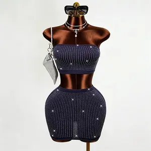 Navy blue two-piece set featuring a close-fitting top embellished with heat-pressed rhinestones and a bodycon skirt