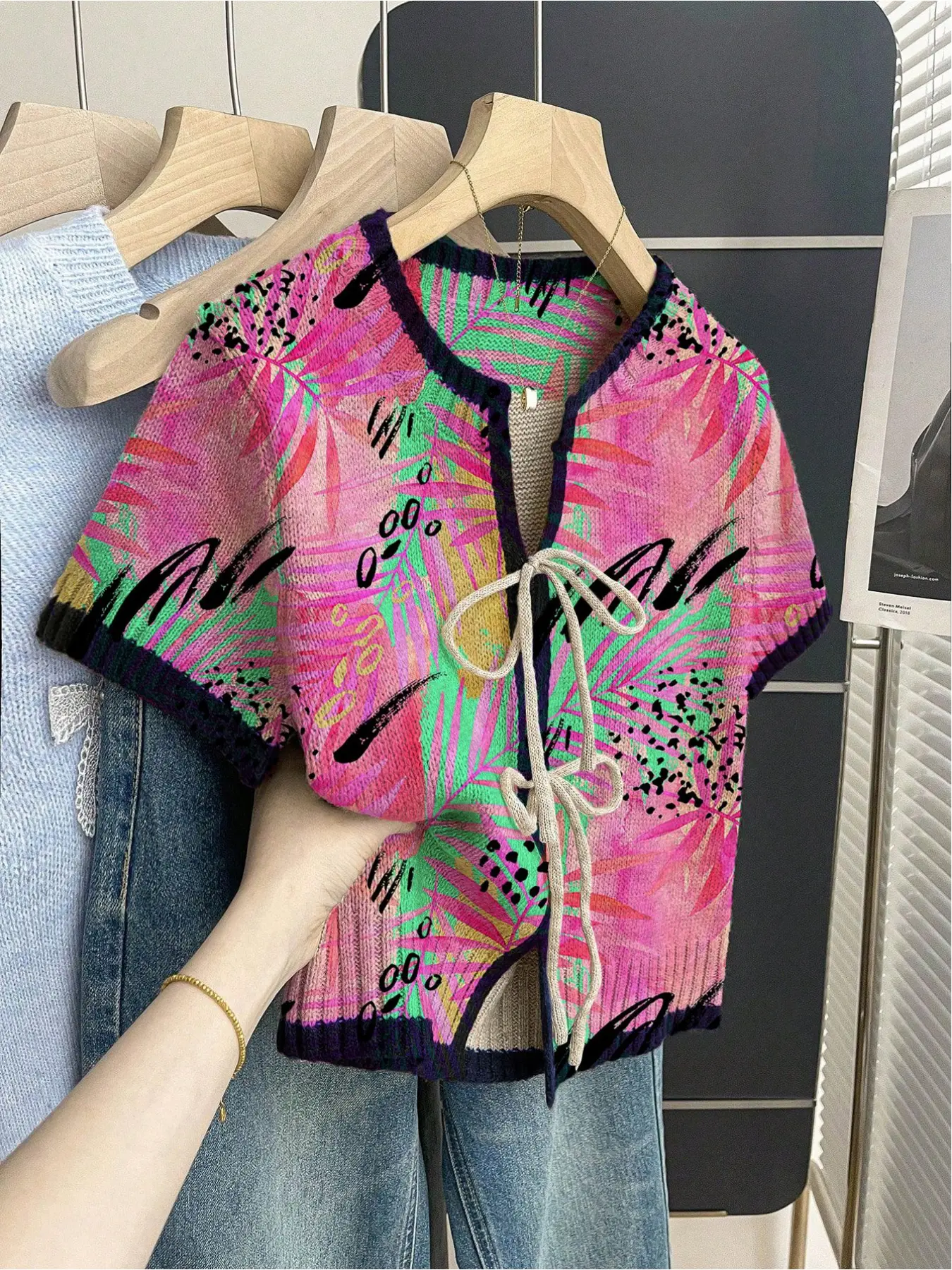 Women's khaki bohemian vacation short-sleeve knit top. Loose round neck, contrast leaf print, front tie and contrast piping. Comfortable for spring & summer casual wear. Casual Blouse Casual Chic Top, Boho Clothing