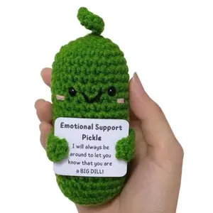 Crocheted Emotional Support Pickle knitting doll
