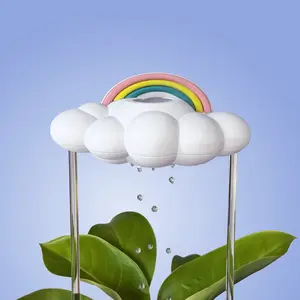 THE CLOUD MAKERS Original Dripping Rain Cloud with Pastel Rainbow Charm 100% Made in USA Patented Design for Plant Watering 6"x3.5" Decorative Waterer