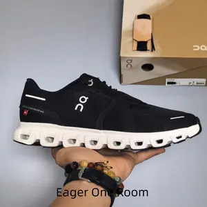 All black breathable mesh unisex running shoes with signature hollow white cloud cushion, minimalist sleek silhouette fits workout, office commute and all daily casual outfits