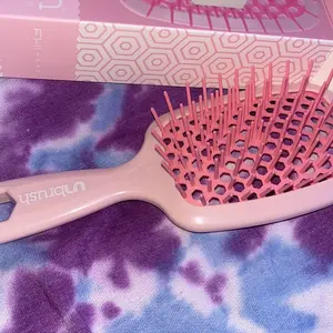 Product Review of Unbrush Detangling Hair Brush by FHI Heat from T**!