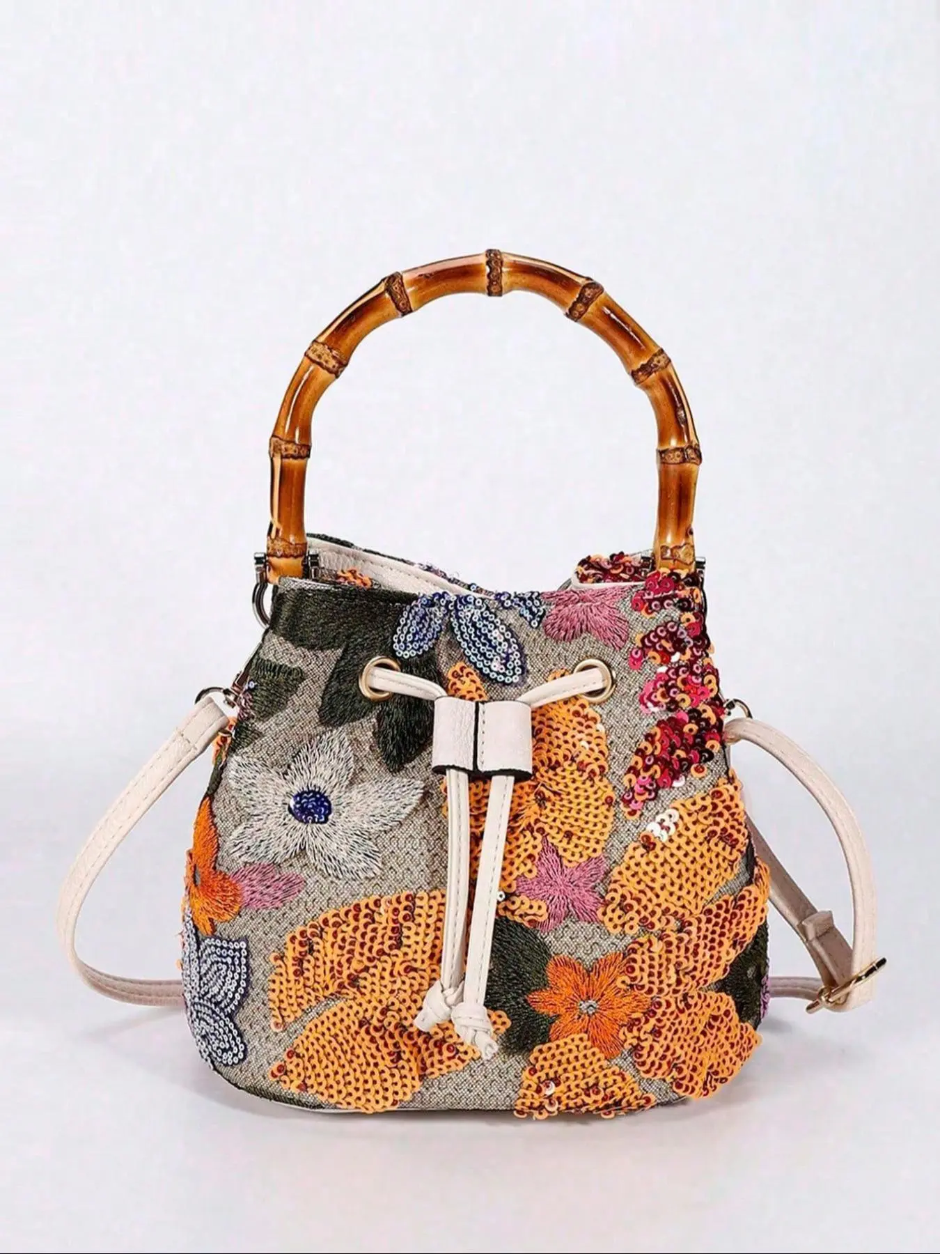 Vintage color blocked bucket bag, Colorblock pattern bag, hand-held boho style crossbody bag, sequin and embroidery decoration, chain shoulder strap design, can accommodate mobile phones and lipstick
