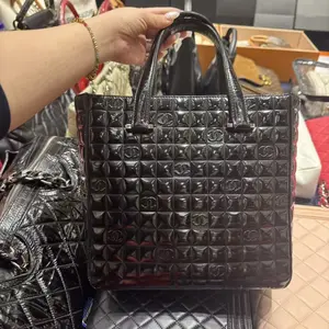 Pre-owned CHANEL H5 black check clutch bz051914