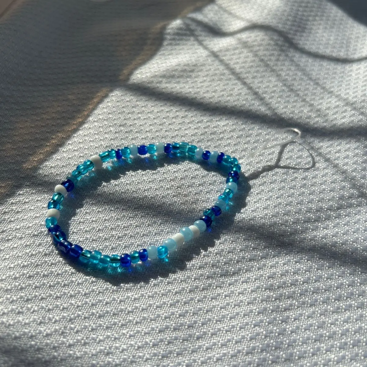 (Small and stretchy )blue phone charm/waterbottle charm