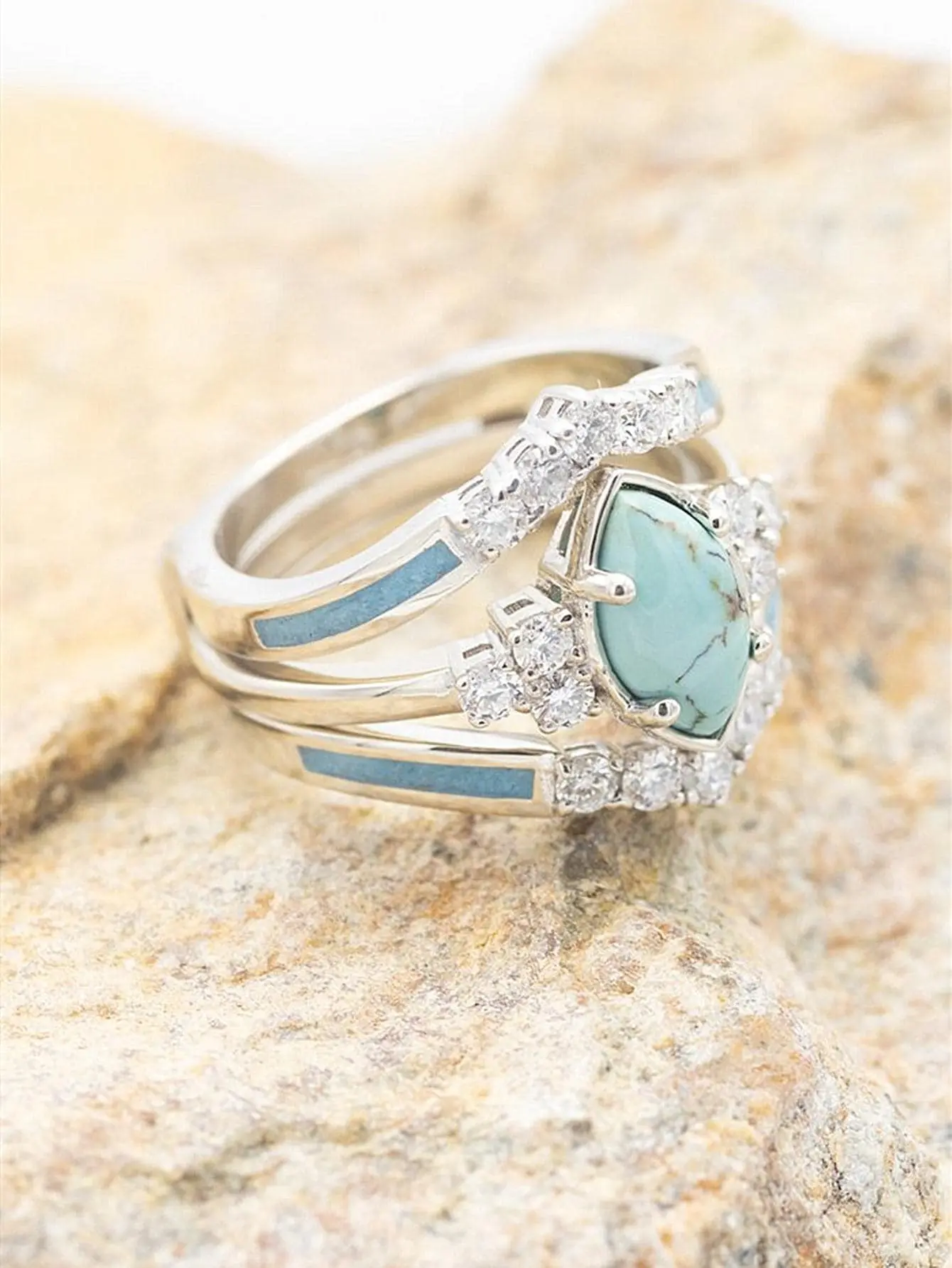 Featuring a stunning hollow design with turquoise and rhinestone accents, this ring makes a meaningful engagement or anniversary gift for your partner