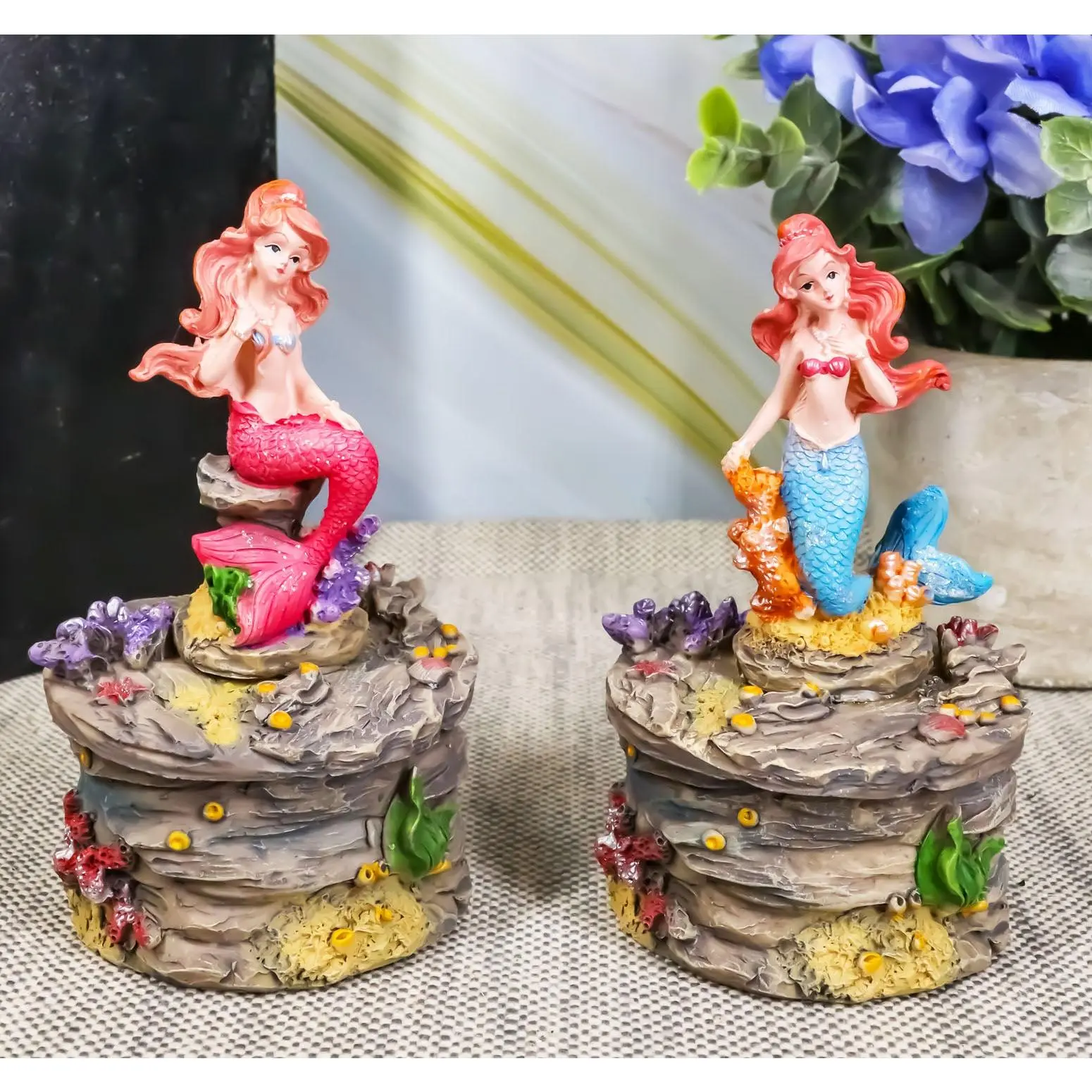 Ebros 4" Tall Blue and Pink Tailed Mermaid Mergirl Sisters Sitting On Coral Rocks Decorative Box Figurine Set of 2