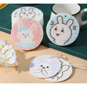 Super-absorbent kitchen cleaning sponge block made from biodegradable wood pulp. Ideal for dishwashing, wiping counters, and general household cleaning. Expands with water, durable, reusable, and multifunctional. Color/style ships randomly.