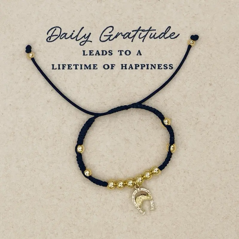 Daily Gratitude Black Bracelet with Golden Horseshoe Charm Adjustable Handwoven Design for Everyday Wear and Layering
