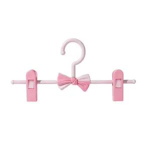 1 Piece Pink Bow Hanger with Anti Slip Clip, Suitable for Clothes of Little Boys and Girls - Durable Plastic, Extendable, Space Saving Design, Perfect for Jeans, Pants, and Skirts