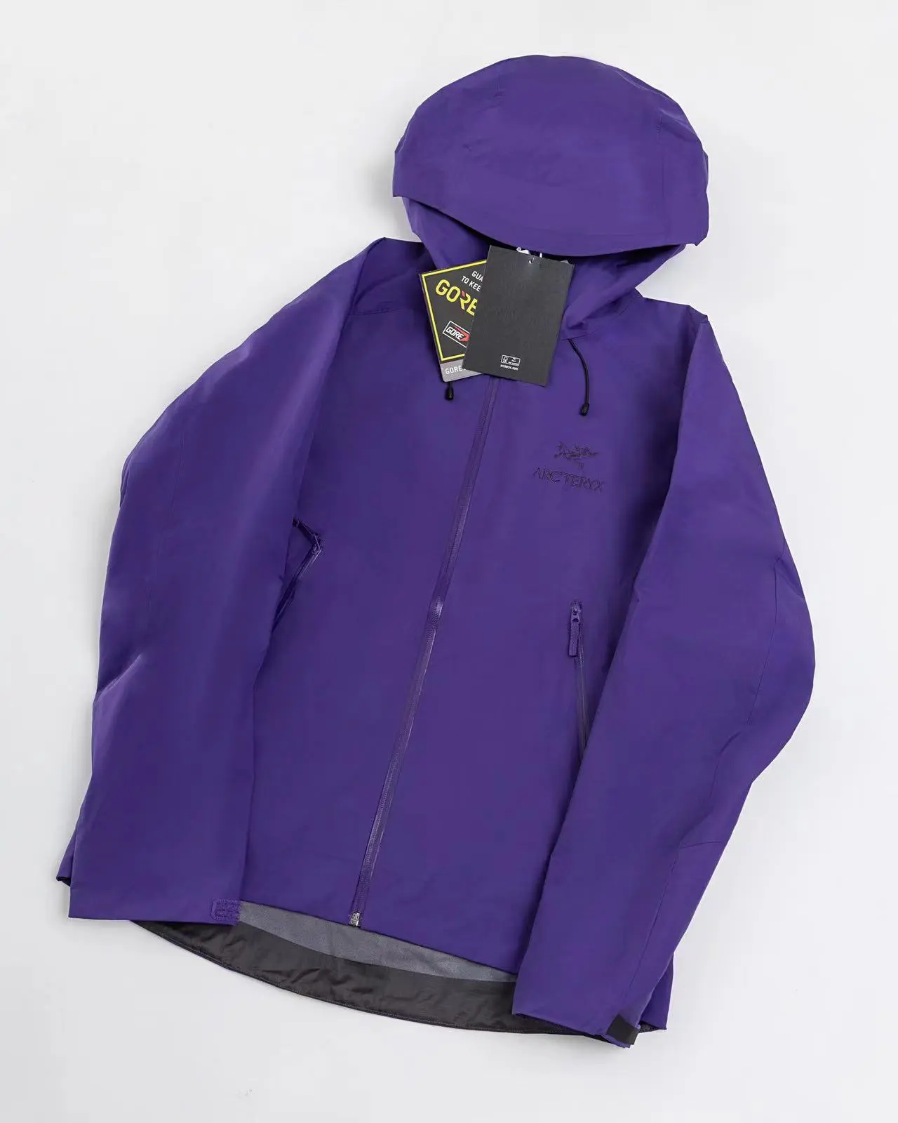Bright Royal-Blue Hooded Outdoor Shell Jacket for Sports Collectibles Enthusiasts - Waterproof, Wind-Resistant Fabric, Full-Zip Closure, Drawstring Hood, Zippered Pockets - Ideal for Hiking, Camping