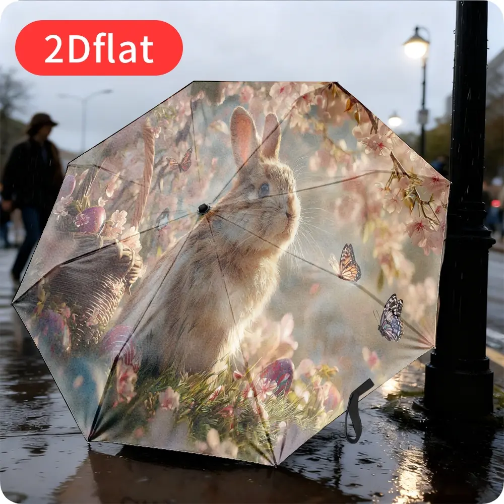 An Easter Bunny Folding Umbrella – Featuring an adorable bunny with a cherry blossom background design, lightweight and portable for outdoor use, durable canopy made of sturdy plastic and metal, perfect for spring