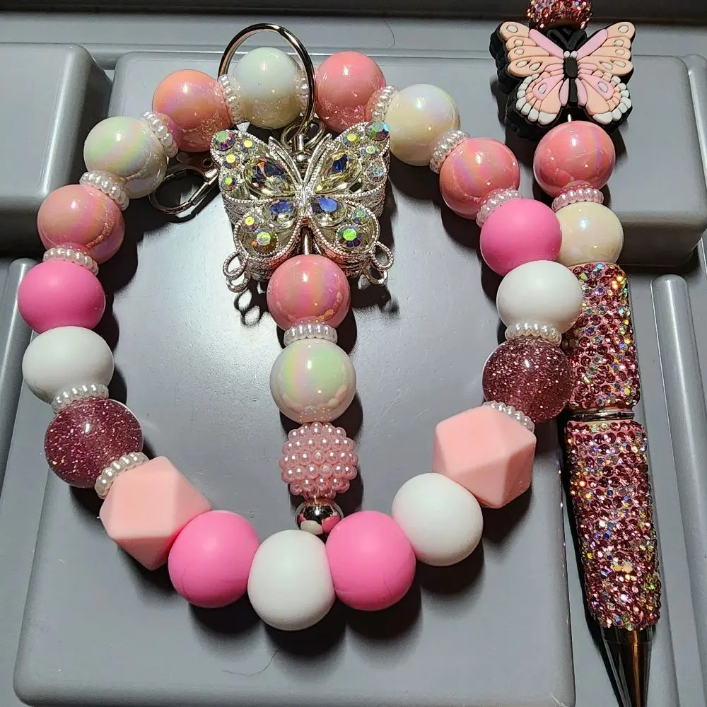 Pink and White Handmade Keychain and Beaded Pen Set with Sparkling Butterfly Charm and Glittery Accents