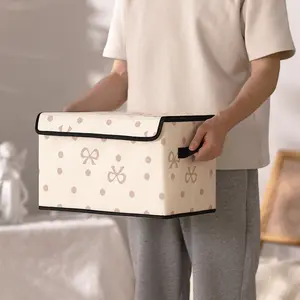 Bow Pattern Printed Lid Storage Box with Handles, Ideal for Organizing Clothes, Blankets, Bed Sheets, and Toys in Bedroom