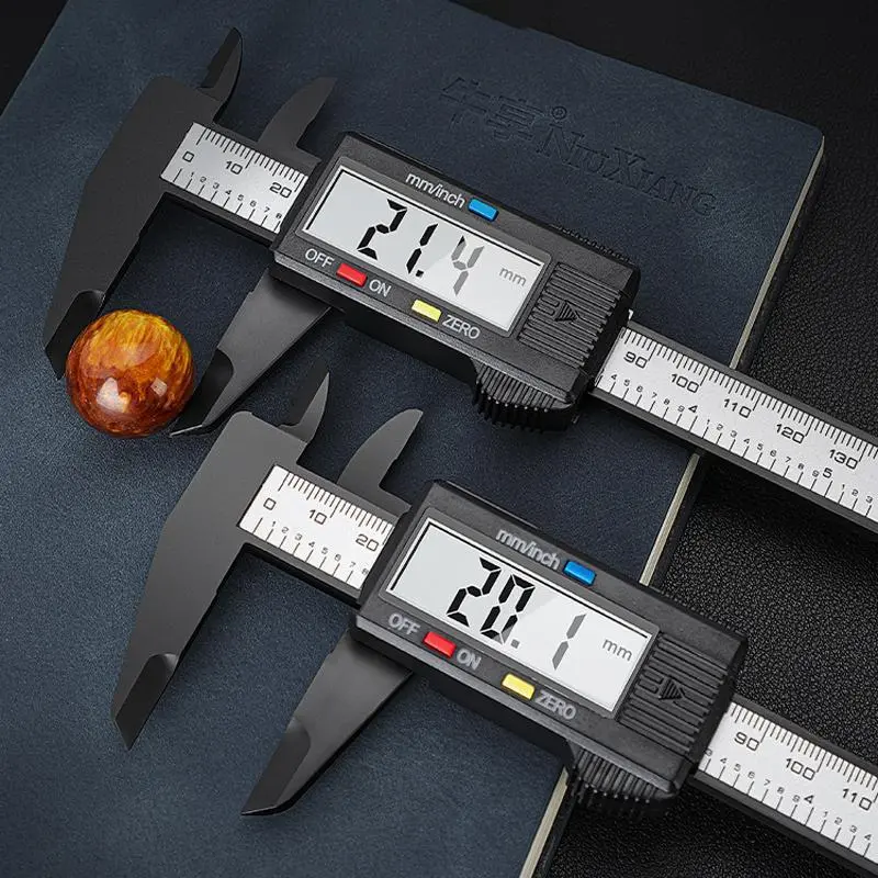 An electronic micrometer measuring tool with an LCD display, using a carbon fiber plastic vernier caliper, a battery-powered precision instrument for furniture hardware parts - measuring range up to 150mm, Digital Calipers