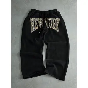 Men’s long pants with a drawstring waist and printed design, stylish letter-print casual sweatpants for everyday wear, comfortable for all seasons