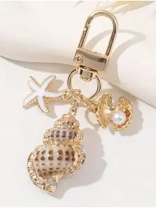 1pc Asymmetrical Shell, Starfish, And Conch Wallet Pendant Decorative Keychain, Ocean Element Conch And Starfish Keyring, Bag Charm For Girls, Vacation Style Accent Piece, Versatile Commuter Decoration, Oceanic Elements