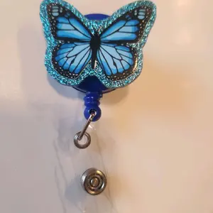 cute blue butterfly badge reel