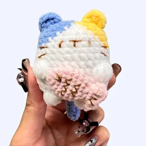 Handmade Amigurumi Crochet Bicolor Cat Holding a Fish Plushie