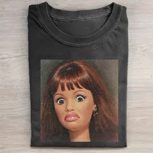 Brunette Barbie Doll Awkward Expression Meme Graphic T-Shirt, Funny Barbiecore Reaction Face Parody, Vintage Doll Pop Culture Aesthetic Streetwear Tee Unisex Cotton Crewneck T-Shirt Menswear Womenswear Streetwear Top