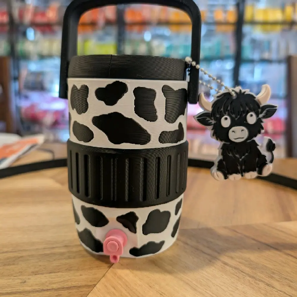 12 oz. Cow Can Koozie and Nail Saver Can Opener Black and White