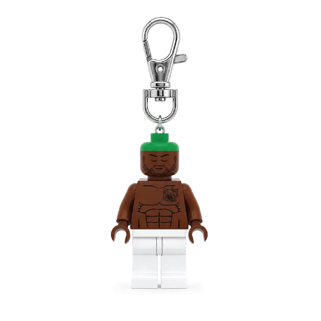 Keychain - Brown Figure with Green Hat and White Pants - Perfect for Collectors and Fans