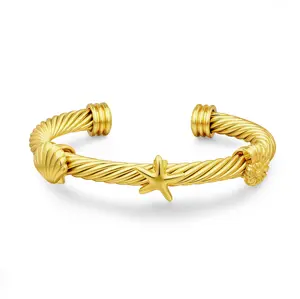 Aprilery Ocean Charm Twisted Golden Cuff Bracelet – With Starfish, Shell & Conch Motifs