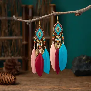A Pair of New Ethnic-Style Diamond-Shaped Carved Feather Earrings with Bohemian Tassels - Perfect for New Year And Holiday Gifts.