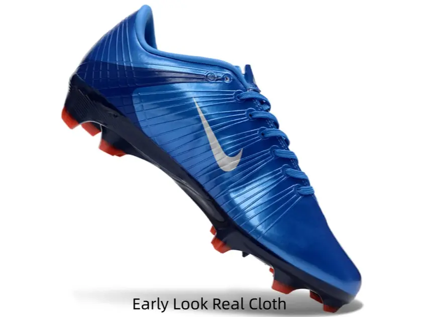 Gloss royal blue soccer cleats with silver logo & red studs, vibrant pro match look ：，