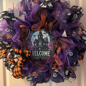 Halloween Inspired Wreath with Purple Orange and Black Colors featuring "WELCOME" Text and Spooky Designs