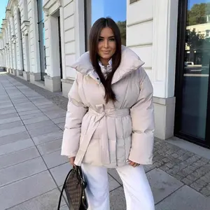 Women’s mid-length puffer coat with large lapels, belted waist, warm winter jacket, loose padded outerwear
