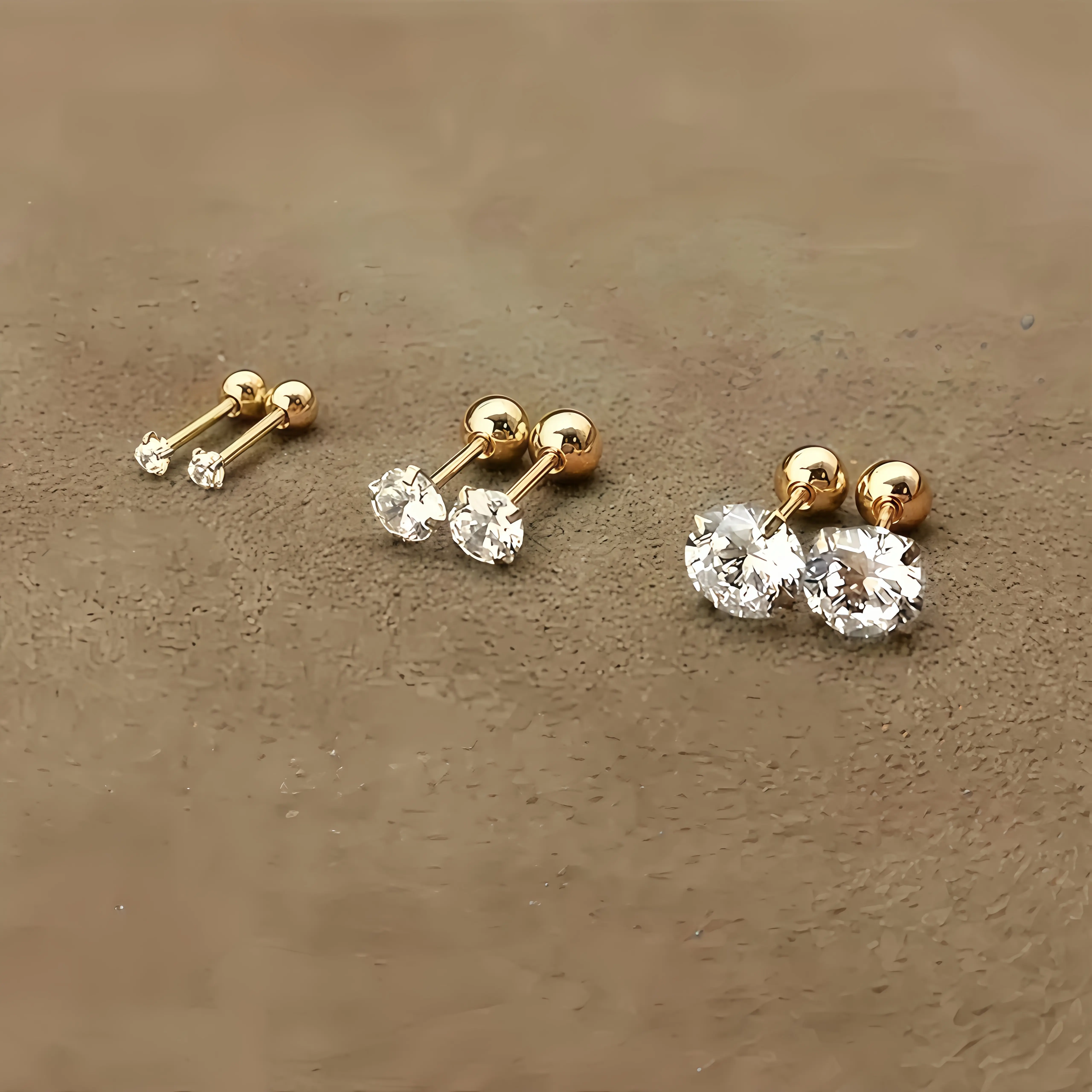 3 Pairs Titanium Steel Gold Tone CZ Stud Earrings, Four-Claw Twisted Ball Design Hypoallergenic Earrings for Women Daily Wear