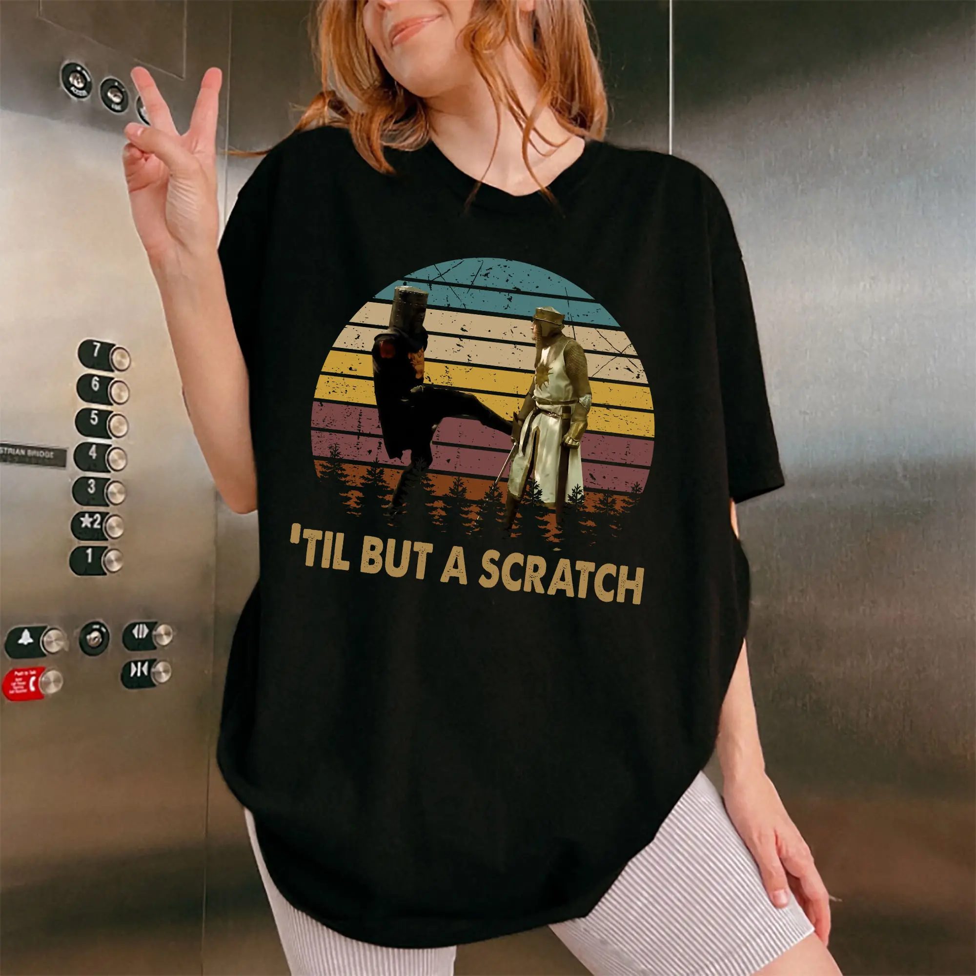 Vintage Graphic T-Shirt with 'Tis But A Scratch' Monty Python Quote, Comfortable Cotton Casual Streetwear Top for Men & Women, Beach, Fitted
