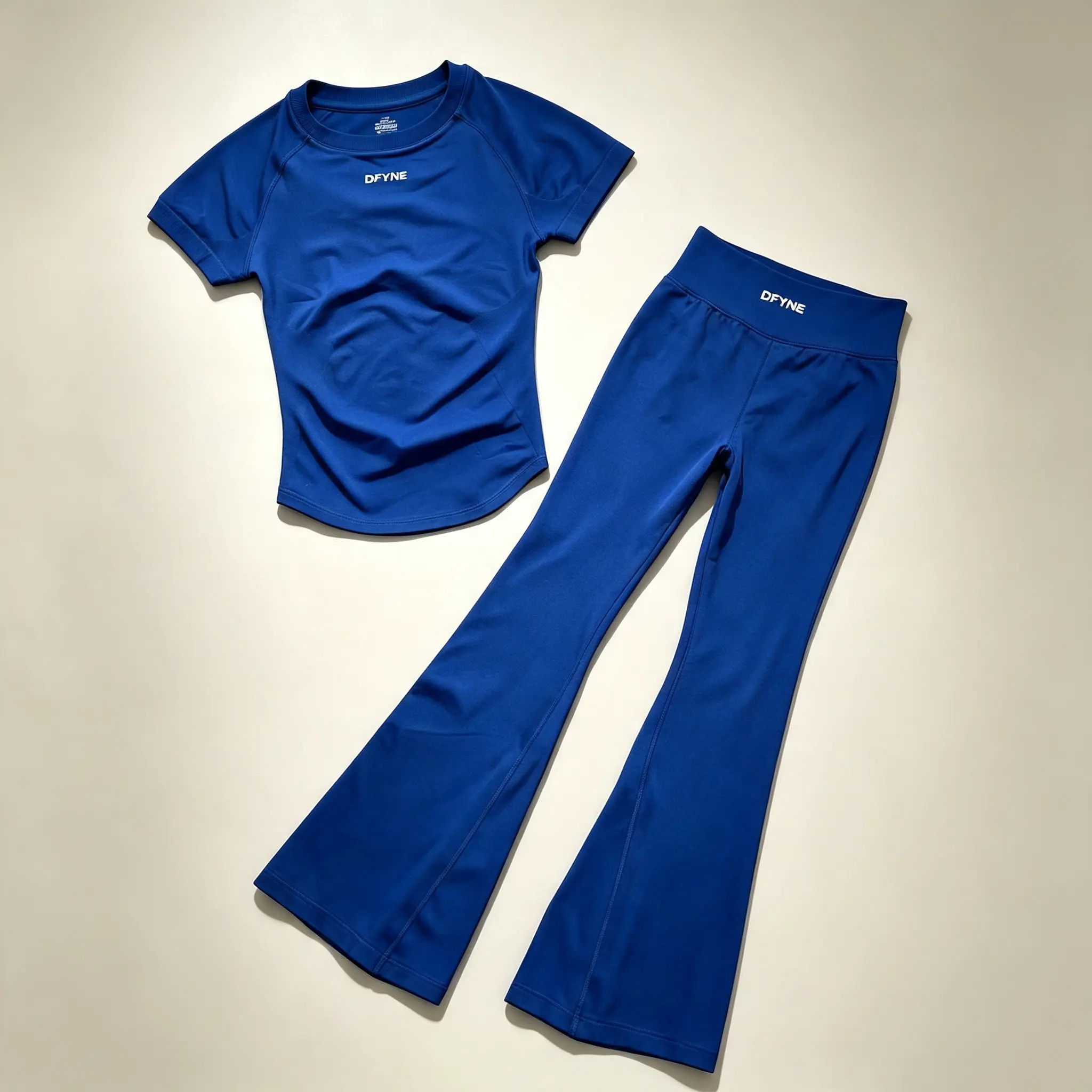 DFYNE 2 Piece Seamless Gym Outfit for Women: Slim Fit Short Sleeve Tee & High Waist Butt-Lifting Flare Leggings Set