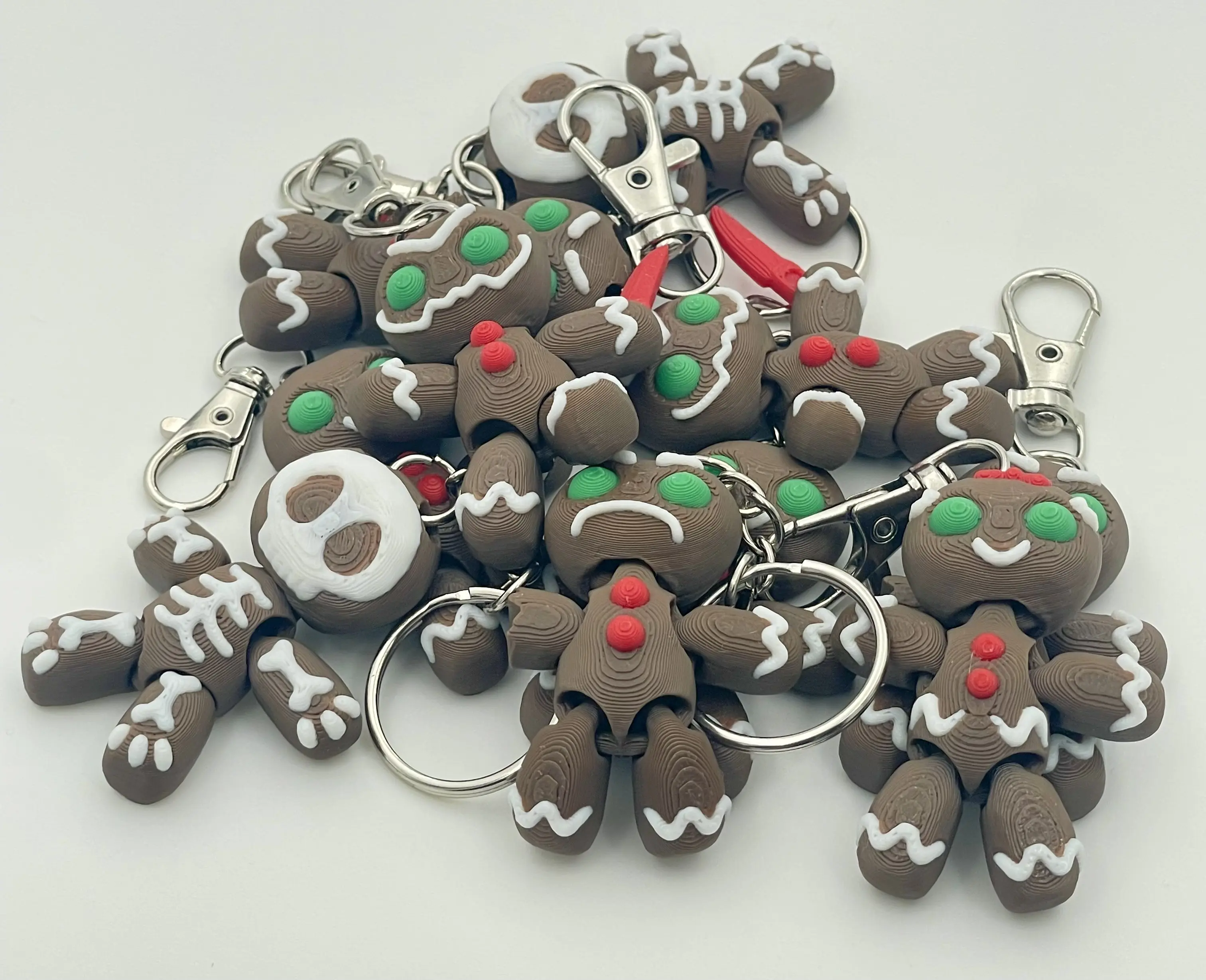 Adorable (and a little twisted) 2-inch 3D printed gingerbread keychains