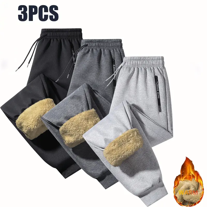 3-pack men’s fleece-lined warm jogging pants; windproof, insulated, thick winter sports pants with elastic drawstring design and zippered pockets at the pant legs; casual athletic long pants