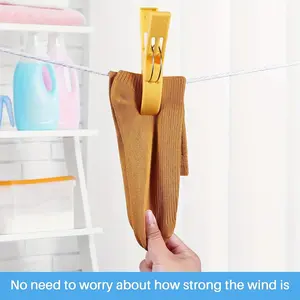 1 beach towel clip, chair clip, towel rack, plastic clothespin, hanging clip, clip, clothes clip.