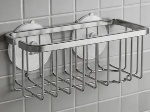 Rust-resistant sink sponge holder with adhesive mounting, suitable for kitchen and bathroom use. An extra suction cup is included for flexible installation. Sponges and brushes are not included. Dimensions: 7.4 × 3.3 × 2.75 inches, 2-piece set.