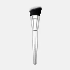 FOUNDATION BRUSH - A luxe, custom foundation brush designed to seamlessly build, buff and blend with control and ease.