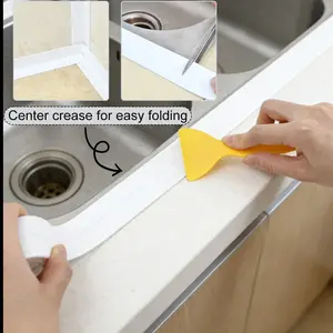 3.8 x 126in Waterproof & Moisture-Resistant Tape with Multi-Purpose Scraper, Ideal for Kitchen and Bathroom Sealing, Toilet Joints, Corners, Instant Application, Peel-and-Stick Design