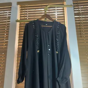 Aisha Abaya - Elegant Black Abaya  and Button Detailing for Women