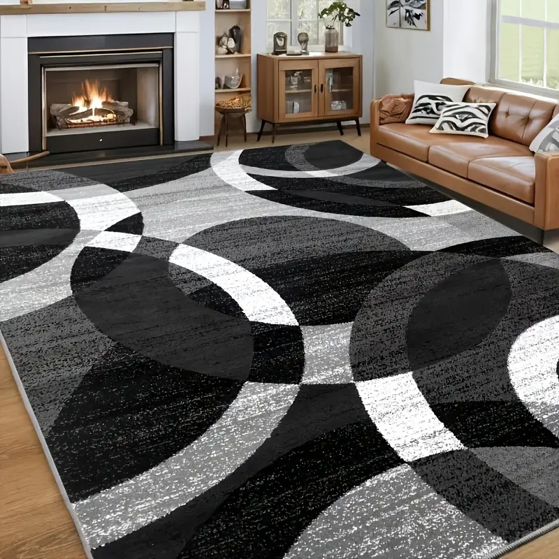 A minimalist round rug available in a variety of sizes. It features a non-slip design, is soft and comfortable, and is machine-washable. Ideal for bedrooms, next to the bed, dorm rooms, living rooms, and other home decor settings.