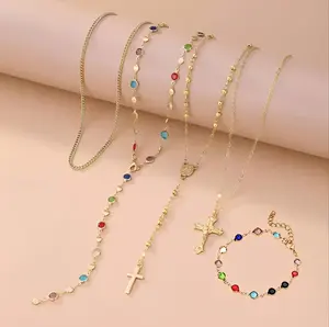 4PCS Layered Gold Cross Necklaces and 1 Pcs Bracelet for Women – Trendy Bohemian Bead Pearl Y Long Pendant Necklace Set, Vintage Rosary Necklace Stack, Adjustable Length Layered Chain – Perfect for Daily, Party, Wedding, or Gift