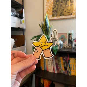 Star with Sword sticker by Wheezing Out Cheese