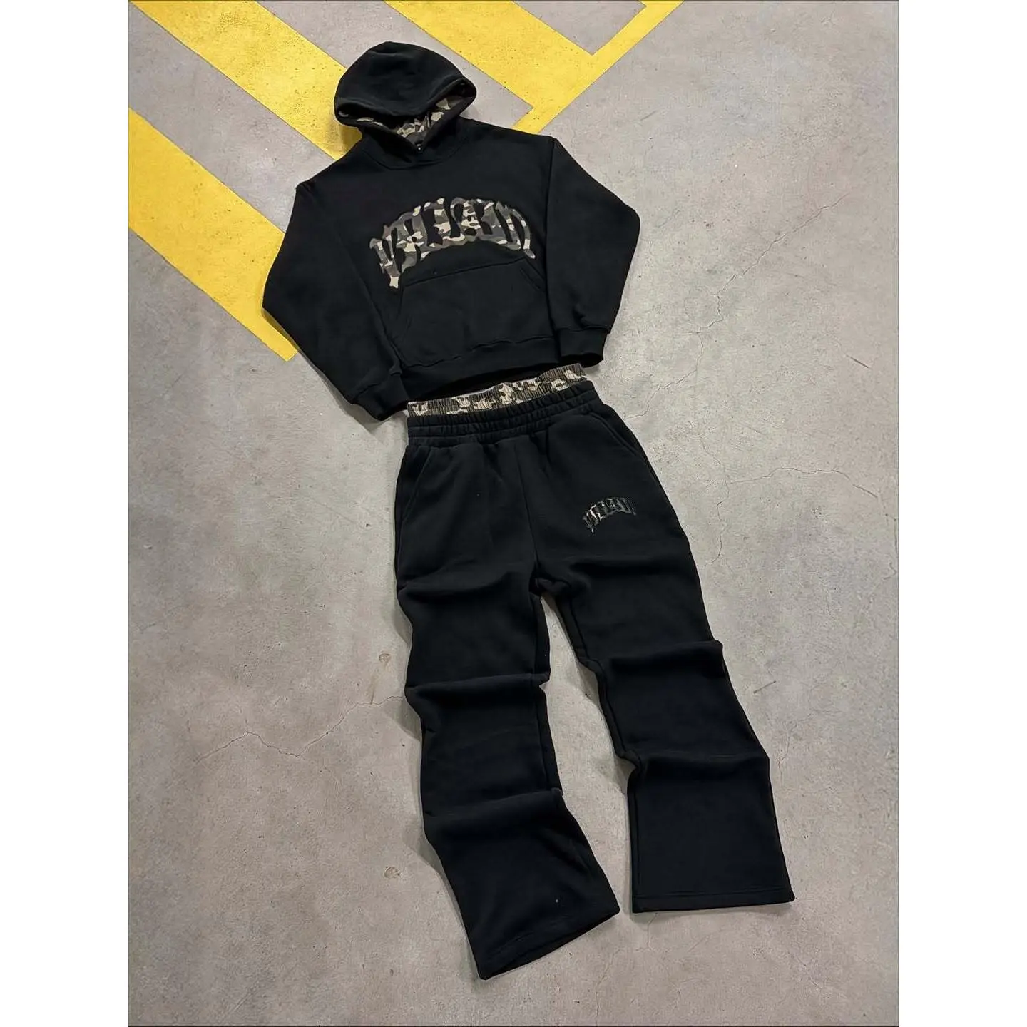 Black camouflage suit