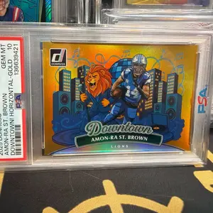 2025 DONRUSS - AMON-RA ST. BROWN - GOLD DOWNTOWN - PSA 10